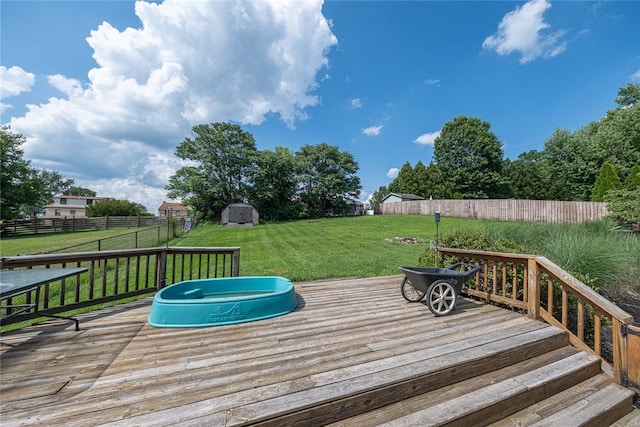315 Pennsylvania Ave, Plum Boro, PA 15147 - wooden deck with a storage shed and a fenced backyard