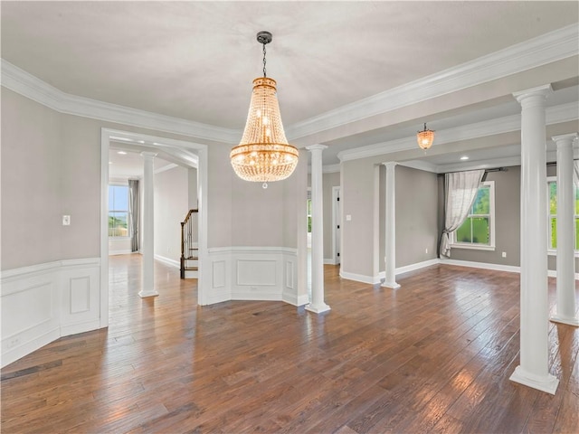 4402 Walnut Ridge Cir, South Fayette, PA 15057 - unfurnished room with plenty of natural light, hardwood / wood-style floors, a wainscoted wall, ornamental molding, and ornate columns