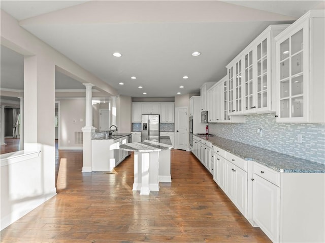 4402 Walnut Ridge Cir, South Fayette, PA 15057 - kitchen with stainless steel appliances, light stone countertops, white cabinetry, tasteful backsplash, and dark wood-style floors