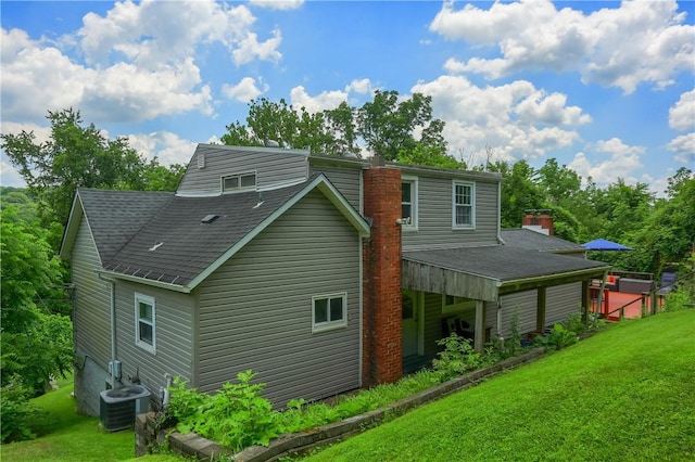 866 Connolly Ave, South Park, PA 15236 - back of property with a lawn, a shingled roof, and a chimney
