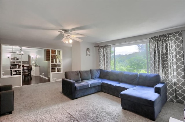 866 Connolly Ave, South Park, PA 15236 - carpeted living room with ceiling fan and a chandelier