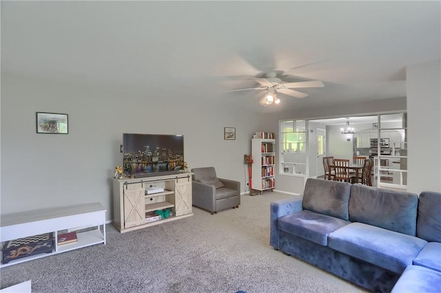 866 Connolly Ave, South Park, PA 15236 - carpeted living area featuring a ceiling fan and a chandelier