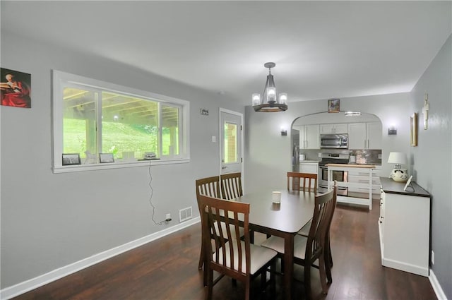 866 Connolly Ave, South Park, PA 15236 - dining area with dark wood-type flooring and a chandelier