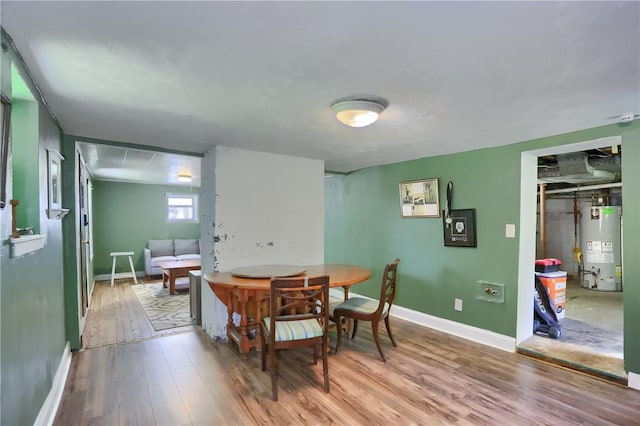 866 Connolly Ave, South Park, PA 15236 - dining room with water heater and wood finished floors