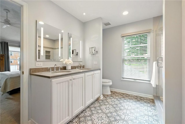 327 Indian Ridge Dr, Moon/Crescent Twp, PA 15108 - ensuite bathroom featuring healthy amount of natural light, a stall shower, ceiling fan, double vanity, and recessed lighting