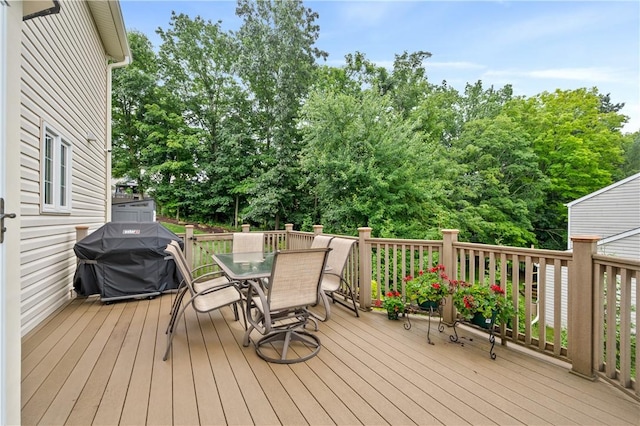 327 Indian Ridge Dr, Moon/Crescent Twp, PA 15108 - wooden deck with a grill, outdoor dining space, and view of wooded area