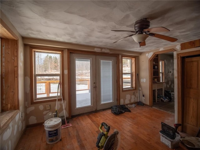 1276 Glades Pike, Somerset, PA 15501 - doorway to outside featuring french doors, plenty of natural light, ceiling fan, and wood-type flooring