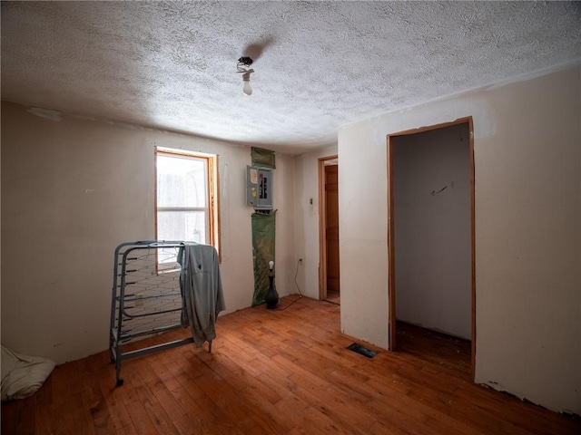 1276 Glades Pike, Somerset, PA 15501 - spare room featuring wood finished floors and a textured ceiling