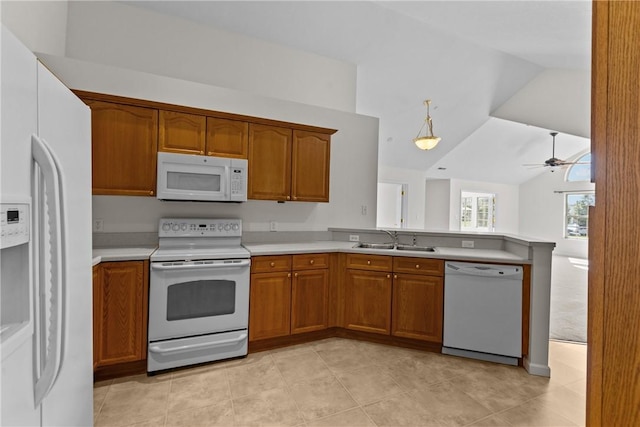 1901 Golf Course Dr, South Strabane, PA 15301 - kitchen with white appliances, brown cabinetry, a peninsula, light countertops, and vaulted ceiling