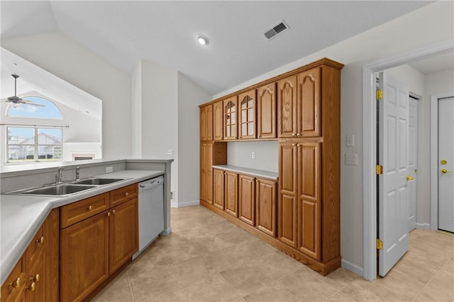 1901 Golf Course Dr, South Strabane, PA 15301 - kitchen with white dishwasher, lofted ceiling, brown cabinets, and light countertops