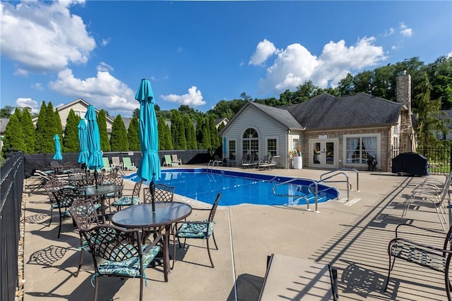 1901 Golf Course Dr, South Strabane, PA 15301 - community pool featuring french doors, a patio, and a grill