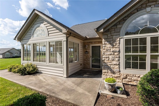 1901 Golf Course Dr, South Strabane, PA 15301 - entrance to property featuring stone siding, a patio, and a shingled roof