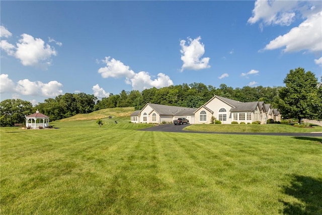 1901 Golf Course Dr, South Strabane, PA 15301 - view of grassy yard featuring asphalt driveway