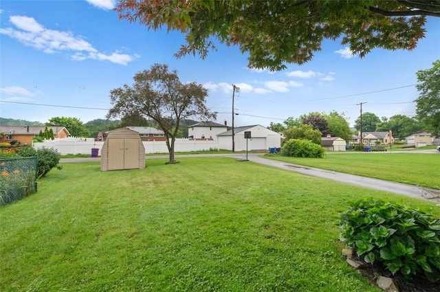 235 Ruth St, Plum Boro, PA 15239 - view of yard with a storage unit and a detached garage