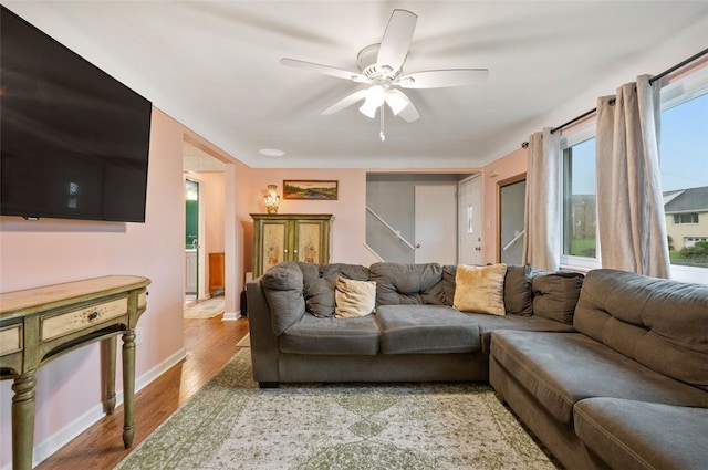 235 Ruth St, Plum Boro, PA 15239 - living area featuring a ceiling fan and light wood-style flooring
