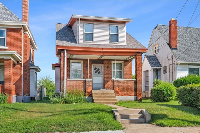 2959 Churchview Ave, Baldwin Boro, PA 15227 - bungalow-style home featuring brick siding, covered porch, and a front yard