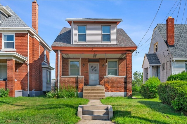 2959 Churchview Ave, Baldwin Boro, PA 15227 - bungalow-style house featuring brick siding, a front lawn, a porch, and roof with shingles