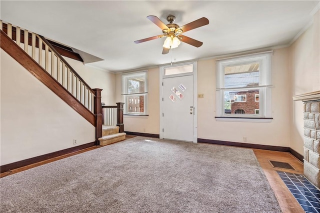 2959 Churchview Ave, Baldwin Boro, PA 15227 - entryway with stairway, ornamental molding, a ceiling fan, a stone fireplace, and carpet