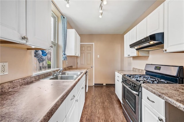 2959 Churchview Ave, Baldwin Boro, PA 15227 - kitchen with gas range, under cabinet range hood, dark wood-type flooring, white cabinetry, and light countertops