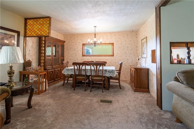 5731 Interboro, Lincoln Place, PA 15207 - carpeted dining room with a chandelier and wallpapered walls