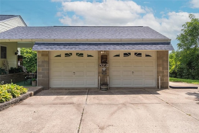 5731 Interboro, Lincoln Place, PA 15207 - garage featuring concrete driveway