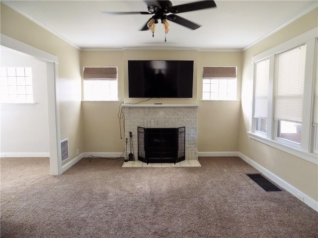 437 Green St, Munhall, PA 15120 - unfurnished living room featuring ornamental molding, healthy amount of natural light, carpet, ceiling fan, and a brick fireplace