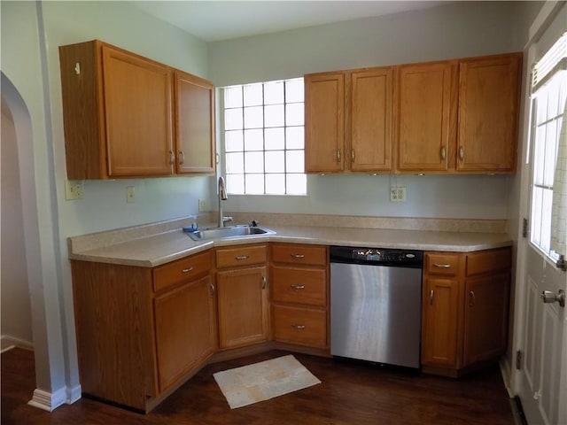 437 Green St, Munhall, PA 15120 - kitchen featuring dishwasher, dark wood-style flooring, light countertops, and brown cabinets