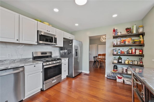 637 Bigelow St, Greenfield, PA 15207 - kitchen with appliances with stainless steel finishes, white cabinets, light wood finished floors, recessed lighting, and open shelves