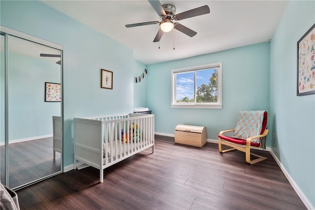 637 Bigelow St, Greenfield, PA 15207 - bedroom featuring wood finished floors, a nursery area, a ceiling fan, and a closet