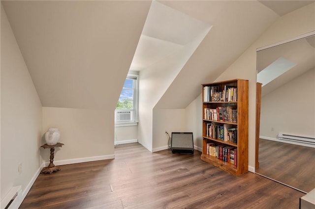637 Bigelow St, Greenfield, PA 15207 - additional living space with baseboard heating, vaulted ceiling, wood finished floors, cooling unit, and a baseboard heating unit
