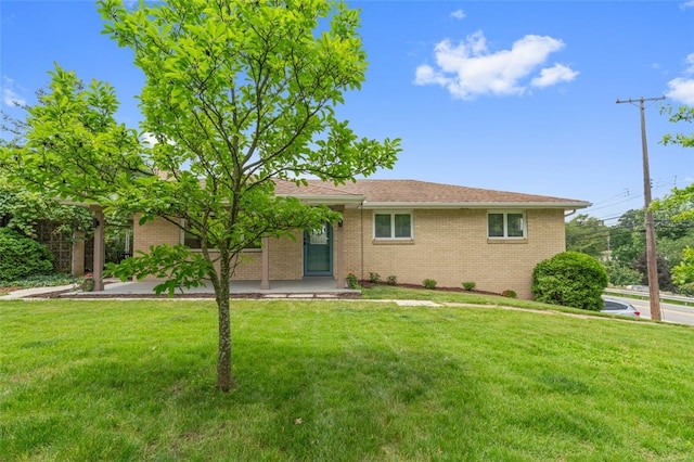 300 Jacks Run Rd, Ross Twp, PA 15202 - ranch-style house featuring a front yard and brick siding