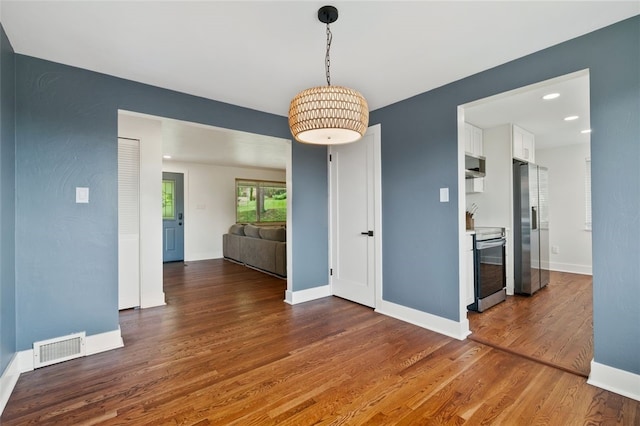300 Jacks Run Rd, Ross Twp, PA 15202 - spare room featuring wood finished floors and recessed lighting