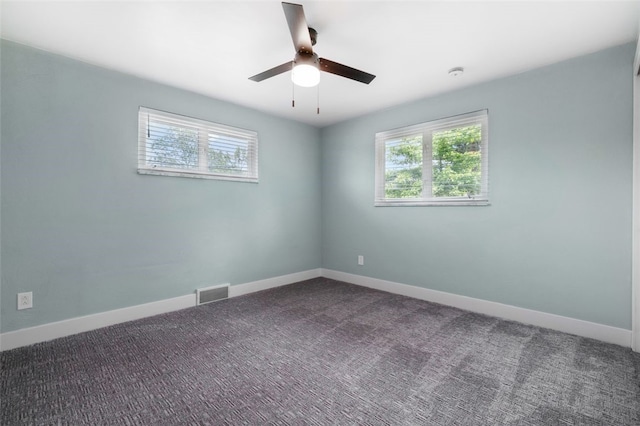 300 Jacks Run Rd, Ross Twp, PA 15202 - spare room with a ceiling fan, dark colored carpet, and a smoke detector