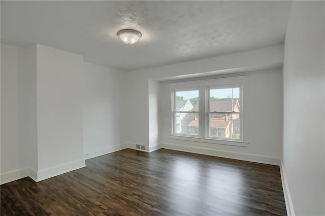 1311 Irwin St, Aliquippa, PA 15001 - empty room with dark wood-style flooring