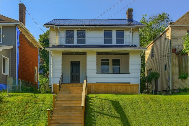 1311 Irwin St, Aliquippa, PA 15001 - traditional style home featuring a metal roof, a chimney, and stairway