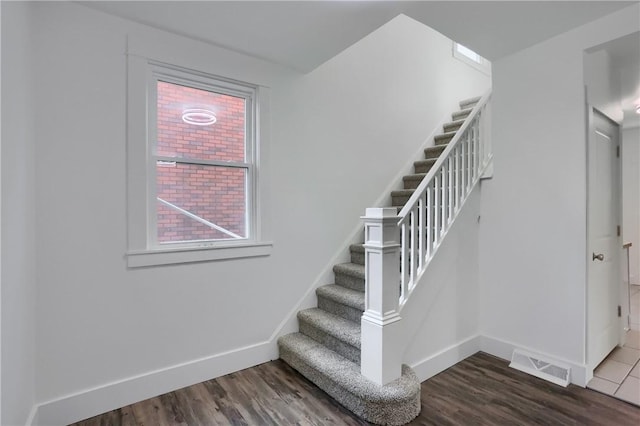1311 Irwin St, Aliquippa, PA 15001 - stairway featuring baseboards and wood finished floors