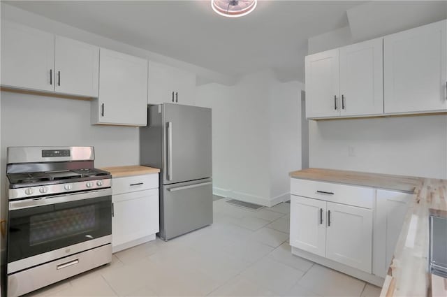 1311 Irwin St, Aliquippa, PA 15001 - kitchen featuring appliances with stainless steel finishes and white cabinetry