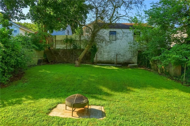 1311 Irwin St, Aliquippa, PA 15001 - fenced backyard with a fire pit
