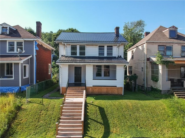 1311 Irwin St, Aliquippa, PA 15001 - view of front of house with a front yard and a metal roof