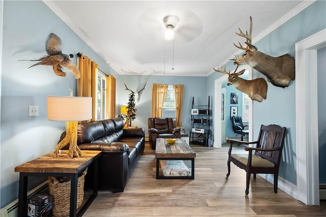 103 Lackawana Ave, Bentleyville, PA 15314 - living area with a ceiling fan, crown molding, wood finished floors, and baseboard heating