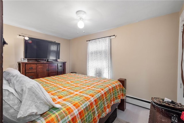 103 Lackawana Ave, Bentleyville, PA 15314 - bedroom with a baseboard heating unit and wood finished floors