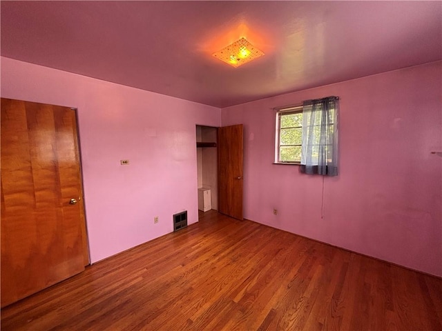 202 Hoeveler St, Springdale Boro, PA 15144 - unfurnished bedroom with wood finished floors and radiator heating unit