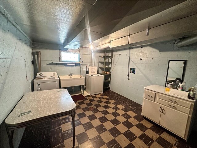 202 Hoeveler St, Springdale Boro, PA 15144 - basement with washing machine and clothes dryer and dark flooring