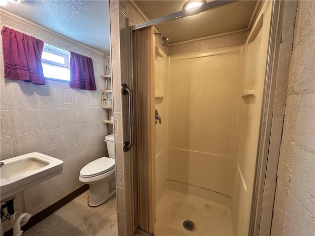 202 Hoeveler St, Springdale Boro, PA 15144 - full bathroom with a stall shower and tile walls