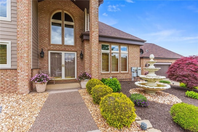 204 S Links Ave, Twp Of But Nw, PA 16001 - view of exterior entry featuring roof with shingles and brick siding
