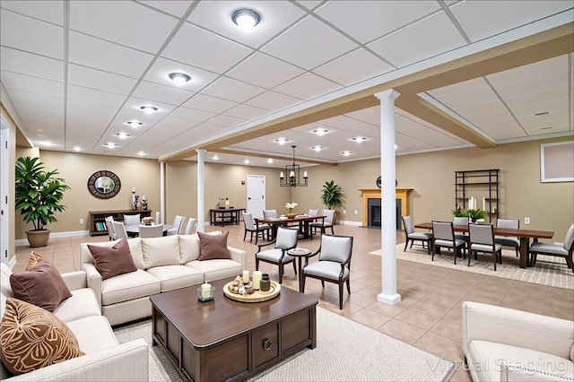 204 S Links Ave, Twp Of But Nw, PA 16001 - living room featuring ornate columns, light tile patterned flooring, and a drop ceiling