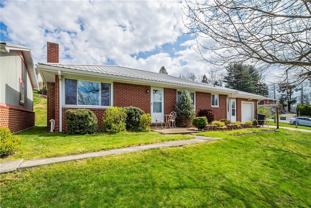 708 Washington St, Bentleyville, PA 15314 - ranch-style home with a garage, brick siding, a chimney, and a front yard