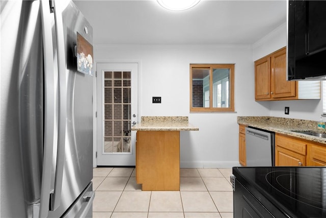 708 Washington St, Bentleyville, PA 15314 - kitchen with appliances with stainless steel finishes, ornamental molding, light tile patterned flooring, light stone countertops, and brown cabinetry