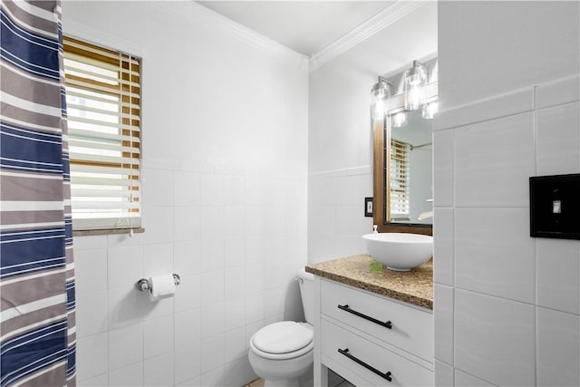 708 Washington St, Bentleyville, PA 15314 - bathroom featuring tile walls, ornamental molding, and vanity
