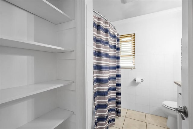 708 Washington St, Bentleyville, PA 15314 - bathroom with tile walls, tile patterned floors, curtained shower, and vanity